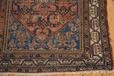 Vintage Malayer rug corner with intricate reciprocating pawn motif border and fringe.