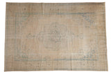 Vintage Distressed Oushak carpet with ivory, beige, and faded pale denim blue medallion.