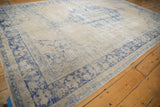 Detail of the mostly even wear across the knot heads on a distressed vintage Oushak carpet.