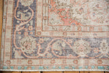 Distressed vintage Sparta carpet border with terra cotta, ivory, deep dusty green florals.