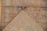 Corner view of Vintage Distressed Sivas rug, showcasing worn pile texture and hand-knotted foundation.
