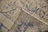 Distressed Oushak rug pile with mostly even wear and visible foundation weave.
