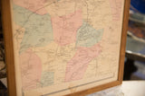 Lower right detail of the 1860s antique Bedford map with faded pink and green tones.