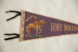 Black felt ties, beige border, and CANADA text on vintage Fort William pennant.