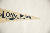 Vintage light beige felt pennant detail with dark blue 'BEACH YORK, MAINE' and subtle creasing.