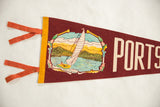 Orange felt ties and yellow binding on the left edge of the vintage Portsmouth flag.