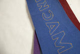 Vintage felt pennant, close-up of cobalt blue with yellow embroidered 'MACK' letters and contrasting red felt.