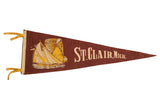 Vintage brown felt St. Clair, Michigan pennant with a graphic of a chief and sailboat.
