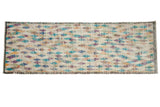 Distressed vintage Tulu rug runner with an ivory field and colorful, playful diamond lattice.