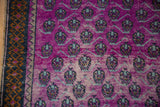 Distressed Oushak runner's aubergine field, mint green vinery, and rams horn border.