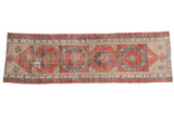 Vintage distressed Oushak runner with faded brick red, charcoal medallions, beige vine borders, 3'2