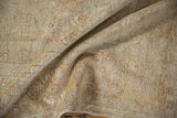 Soft, dense pile with high sheen on the distressed vintage Oushak carpet.