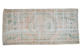 Distressed vintage Oushak runner, faded floral medallion, pale rose, ivory, ocean green, 1'10