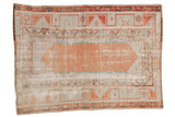 Distressed Vintage Oushak rug with abrashed terracotta field, ivory, turquoise vine palmette borders.