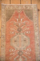 Hand-knotted distressed vintage Oushak rug mat in terracotta and sandalwood.