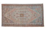 Vintage distressed Oushak runner, floral medallion, soft pastel tones, 1'9