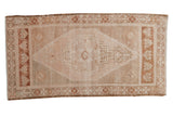 Vintage distressed Oushak rug with stepped medallion, geometric finials, ivory-copper tones, 1'10
