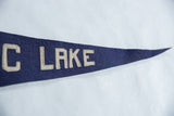 Close-up of Antique Saranac Lake felt pennant, showing cream stitched 