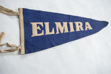 Vintage blue felt Elmira pennant, beige block lettering, and natural tie strings.