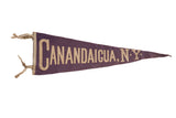 Vintage Canandaigua NY felt banner, purple with off-white lettering, 26x8 inches.