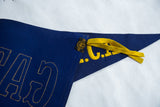 Blue felt vintage YMCA pennant detail: yellow ties, C.A. letters, black label.