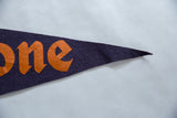 Vintage Firestone felt pennant's pointed end, with orange letters on dark blue felt.