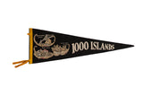 Vintage 1000 Islands felt pennant, black with yellow trim and light beige landmark graphics, 26