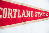 Vintage red felt pennant with cream 'STATE' lettering and tapering tan edge.