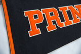 Orange and white felt 'PRIN' letters on black vintage Princeton banner with orange edge.