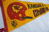 Vintage Kansas City Chiefs yellow felt pennant showing red helmet logo and 1967 NFL mark.