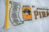 Cream, gold, and black Pittsburgh Pirates felt pennant with team logo and roster.