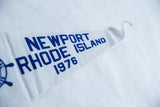 White felt pennant detail showing blue 'RHODE ISLAND 1976' text and subtle creasing.