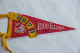Red felt International Bridge graphic and yellow 1970 date on vintage pennant.