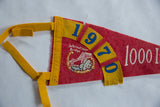 Red and yellow felt banner with blue 1970 date and International Bridge graphic.