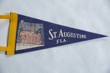 Vintage St. Augustine FL felt pennant corner with yellow border and school graphic.