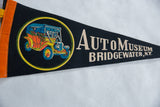 Black felt pennant with orange trim, featuring vintage car graphic and Bridgewater NY text.