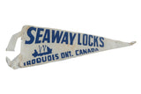 Off-white vintage felt pennant for Seaway Locks, Ontario with blue lettering and a ship design.