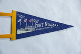 The felt texture and condition of a vintage Old Fort Niagara souvenir pennant.