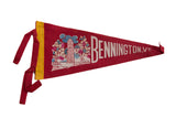 Vintage Bennington VT felt flag: red with monument graphic, white text, yellow trim.