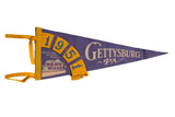 Vintage 1951 Gettysburg PA felt pennant flag with purple, yellow, museum graphic, 17 by 7 inches.