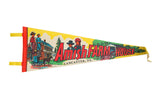Vintage yellow felt pennant with a colorful graphic of an Amish farm, family, and horse-drawn buggy.
