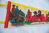Vintage Amish pennant's felt graphic showing children, a farmhouse, and horse-drawn buggy.
