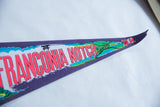 Pointed tip of the vintage felt pennant, showing red N.H. and Echo Lake.