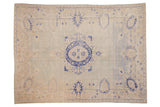 Vintage Distressed Oushak carpet, abrashed field, roundel medallion, faded seafoam, pale denim blue.