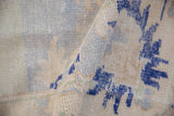 Decorative distressed pile of Vintage Oushak carpet with cobalt blue palmette, abrashed ivory tones.