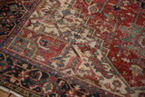 Intricate geometric vinery and floral petals in brick red, ivory, and jade green.