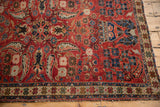 Vintage Northwest Persian rug's cherry red field with Herati boteh motifs and detailed star border.