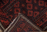 Antique Belouch rug corner with geometric patterns, original goat hair selvage, and minor end loss.