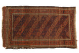 Vintage Belouch rug, paneled lattice floral guls, pawn motif borders, in chestnut, navy, ivory.