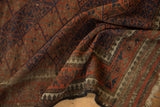 Tattered fringe, striped foundation, and border pattern on a vintage Belouch rug.